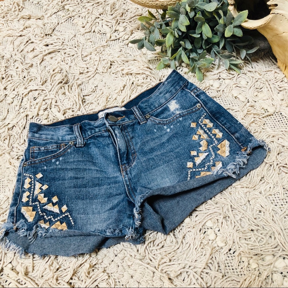 Free People - embroidered & distressed jean shorts